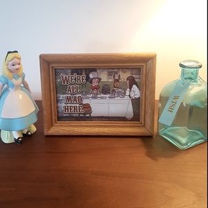 Alice wonderland we're all mad here framed art